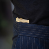Bucqle Oyster Gold worn by model on black pants